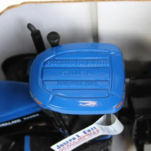 Manufacturer_ERTL Tractors<1/32 New Holland TJ450 4WD Duals, Limited Edition 2001 St. Louis, MO Trade Fair