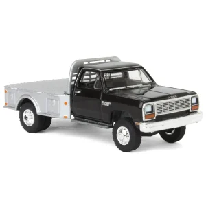 Manufacturer_Greenlight Collectibles Lowboys & Flatbeds | Pickup Trucks<1/64 1985 Dodge Ram W350 Dually Flatbed Pickup Truck, Black with Silver Flatbed, Diecast Direct Exclusive