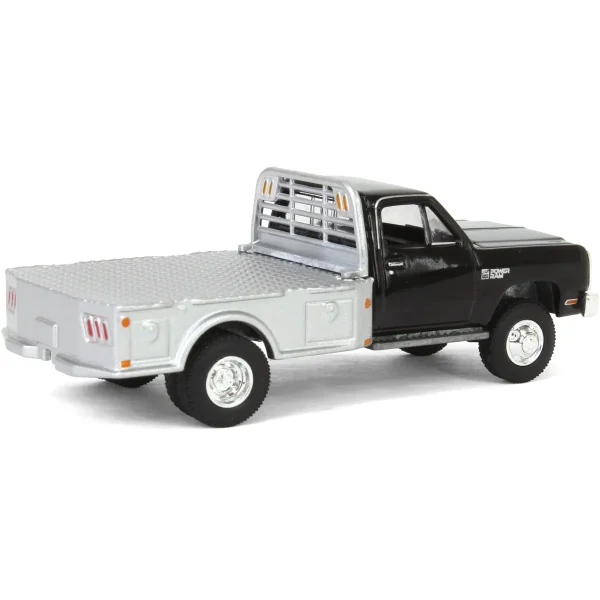 Manufacturer_Greenlight Collectibles Lowboys & Flatbeds | Pickup Trucks<1/64 1985 Dodge Ram W350 Dually Flatbed Pickup Truck, Black with Silver Flatbed, Diecast Direct Exclusive