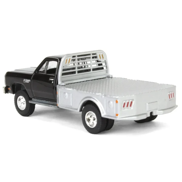 Manufacturer_Greenlight Collectibles Lowboys & Flatbeds | Pickup Trucks<1/64 1985 Dodge Ram W350 Dually Flatbed Pickup Truck, Black with Silver Flatbed, Diecast Direct Exclusive