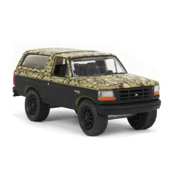 Manufacturer_Greenlight Collectibles Pickup Trucks<1/64 1996 Ford Bronco Lifted, Camo & Black, All-Terrain Series 14