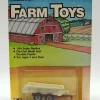 Manufacturer_ERTL Implements<1/64 Red & Cream Tandem Axle Manure Spreader by ERTL